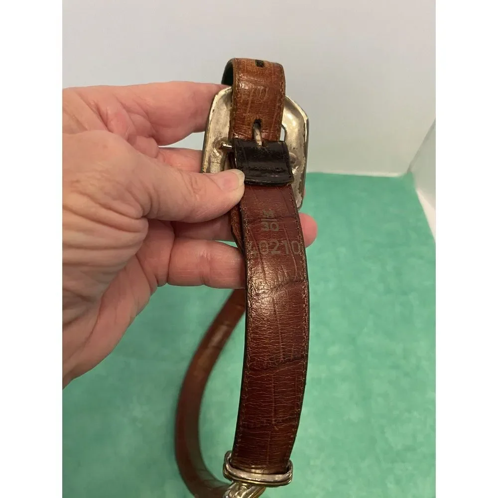 Ladies leather reversible belt black and brown with embellishments. Size med/30.